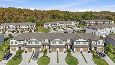 Located in the gated community of Portico, this 3-bedroom, 2 - photo 2