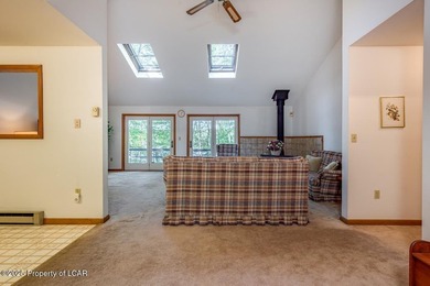Attractive 3BR 2Bth cedar sided lakefront ranch offers stunning - photo 12