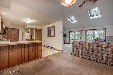 Attractive 3BR 2Bth cedar sided lakefront ranch offers stunning - photo 14