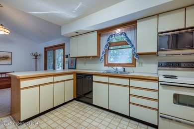 Attractive 3BR 2Bth cedar sided lakefront ranch offers stunning - photo 16