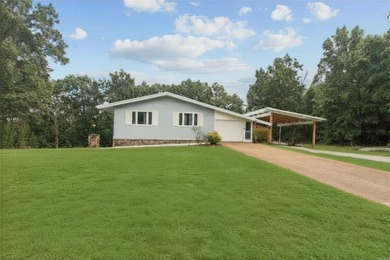 Nestled on 2.46 +/- picturesque acres, this cozy multi-level - photo 1