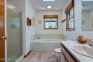 Attractive 3BR 2Bth cedar sided lakefront ranch offers stunning - photo 23