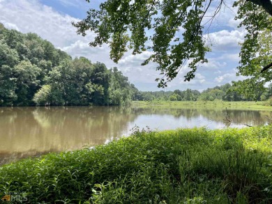 Lake Acreage Off Market in Cumming, Georgia