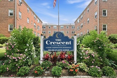 Welcome to the The Crescent, Luxury Cooperative Residence! This - photo 1
