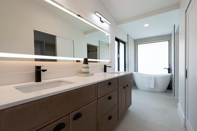 Welcome home to this extensively renovated lakefront home in the - photo 21