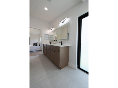 Welcome home to this extensively renovated lakefront home in the - photo 22