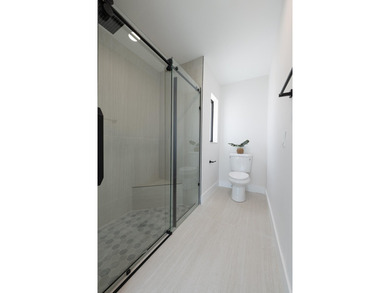 Welcome home to this extensively renovated lakefront home in the - photo 24