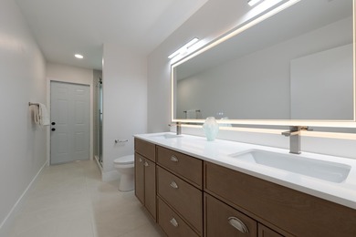 Welcome home to this extensively renovated lakefront home in the - photo 29