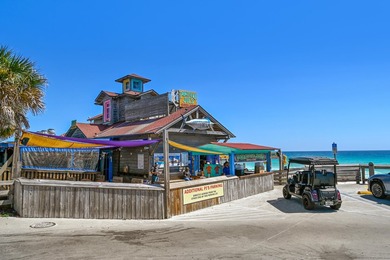 Gulf views take center stage in this beautifully updated - photo 39