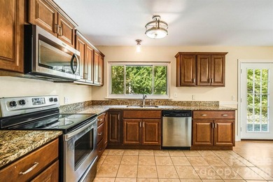 Imagine returning home in sought-after North Asheville. A - photo 13