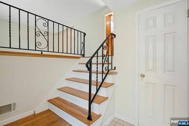 This beautifully updated 3-bedroom, 2-full-bath home offers the - photo 3