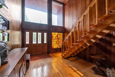 Set on a private and beautifully landscaped .8-acre property - photo 4
