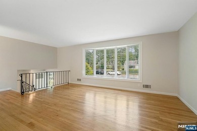 This beautifully updated 3-bedroom, 2-full-bath home offers the - photo 5