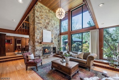 Set on a private and beautifully landscaped .8-acre property - photo 6