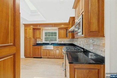 This beautifully updated 3-bedroom, 2-full-bath home offers the - photo 9