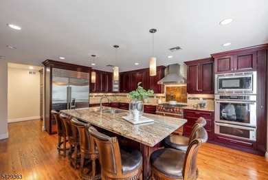 Set on a private and beautifully landscaped .8-acre property - photo 10