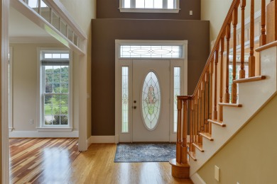 This Stately, all brick colonial is situated on over 1/2 acre