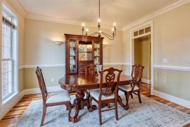 This Stately, all brick colonial is situated on over 1/2 acre