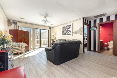 Welcome to this charming two-bedroom, two-bathroom end-unit - photo 6
