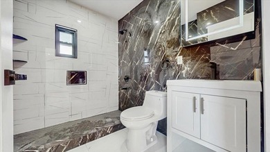 Welcome to this one-of-a-kind, fully gut-renovated 3-level - photo 17