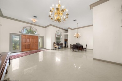 Experience elevated Florida living in this sprawling golf course - photo 5