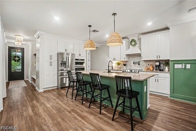 NOW OFFERED FURNISHED! This beautiful 4-bedroom, 2-bath home in - photo 6