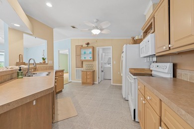 Welcome to this charming 3-bedroom, 2-bathroom waterfront home - photo 1