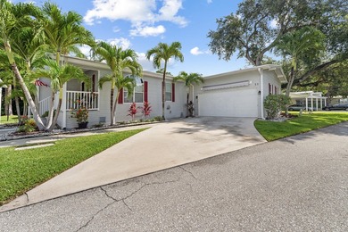 Welcome to this charming 3-bedroom, 2-bathroom waterfront home - photo 2