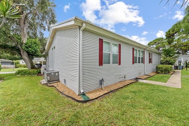 Welcome to this charming 3-bedroom, 2-bathroom waterfront home - photo 8