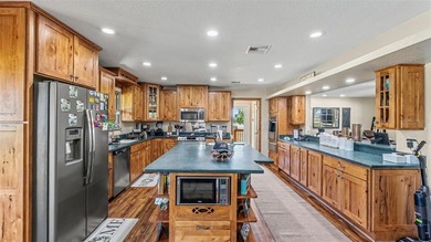 Welcome to 20+ acres of peaceful country living where luxury - photo 11