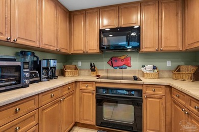 Great condo with spectacular views showcasing tranquil water and - photo 13