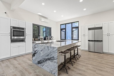 HUGE PRICE IMPROVEMENT - $500,000! 540 feet of water frontage on - photo 19