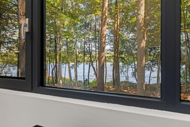 HUGE PRICE IMPROVEMENT - $500,000! 540 feet of water frontage on - photo 26