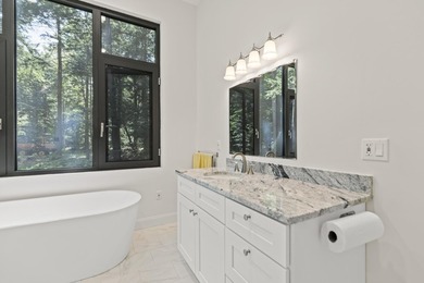 HUGE PRICE IMPROVEMENT - $500,000! 540 feet of water frontage on - photo 37