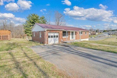 This one-level brick ranch offers plenty of potential and is - photo 1
