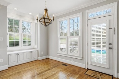 Discover one of McDonough's most exclusive gated estates, where - photo 12