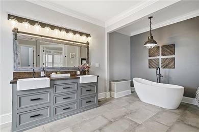 Discover one of McDonough's most exclusive gated estates, where - photo 17