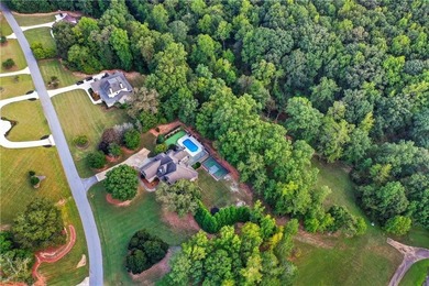Discover one of McDonough's most exclusive gated estates, where - photo 18