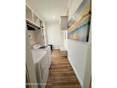 Experience elevated coastal living in this beautifully appointed - photo 19