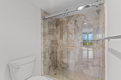 Discover the pinnacle of coastal living in this stunning - photo 24