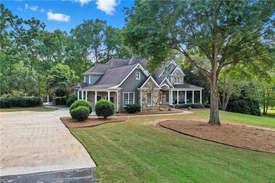 Discover one of McDonough's most exclusive gated estates, where - photo 26