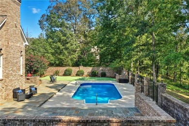Discover one of McDonough's most exclusive gated estates, where - photo 28