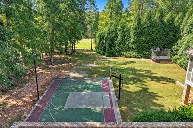 Discover one of McDonough's most exclusive gated estates, where - photo 30