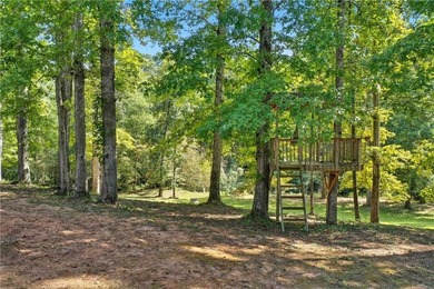 Discover one of McDonough's most exclusive gated estates, where - photo 32