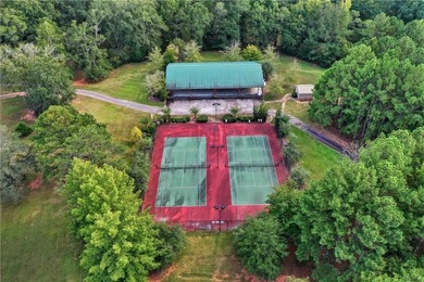 Discover one of McDonough's most exclusive gated estates, where - photo 33