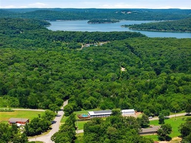 VA-approved and just 2 miles from Lake Tenkiller! This spacious - photo 3