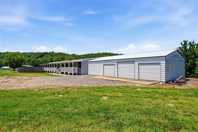 VA-approved and just 2 miles from Lake Tenkiller! This spacious - photo 9