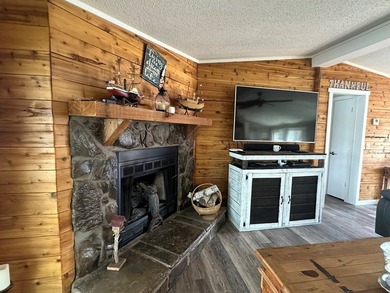 REDUCED!!! Experience ultimate lakeside living on 952 feet of - photo 12