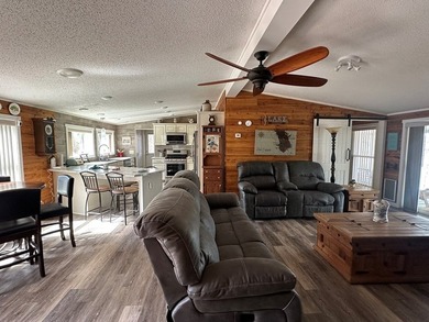 REDUCED!!! Experience ultimate lakeside living on 952 feet of - photo 13