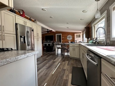 REDUCED!!! Experience ultimate lakeside living on 952 feet of - photo 14
